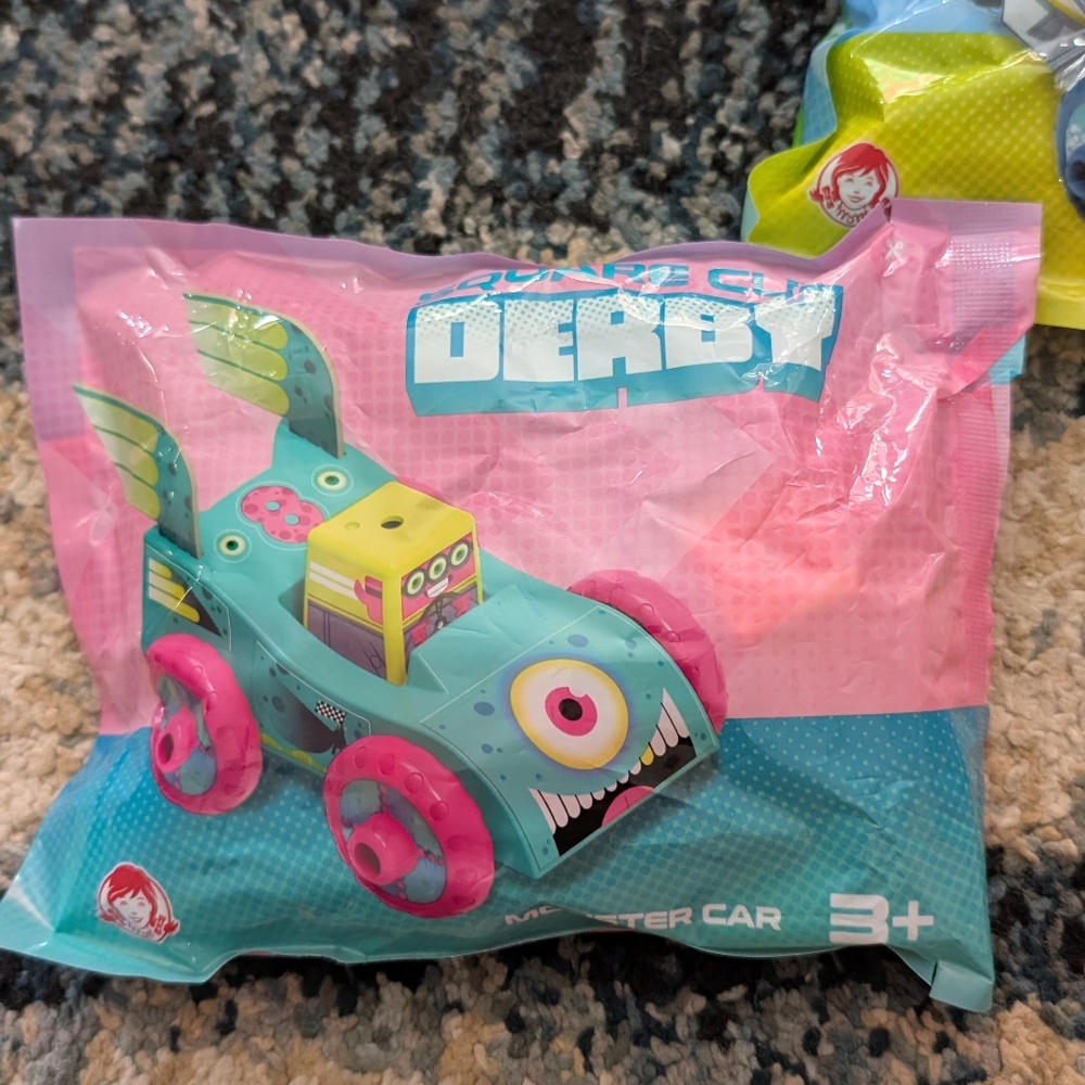 Huge lot of Wendy's 2021 and older toys.Includes: *Sealed Square Up Derby